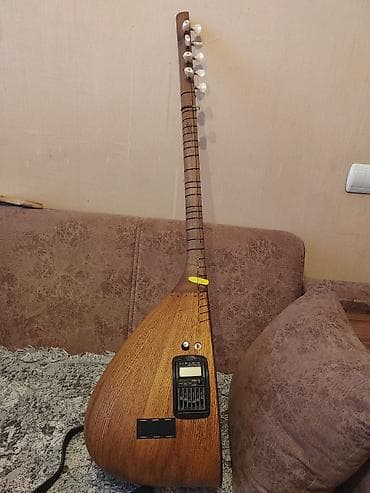 gitara ucuz: Elektron milli saz – peşəkar səhnə və studiya üçün. Burmaclar — 6