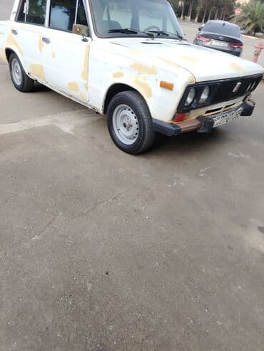 стеклоподъемник ваз: VAZ 2106 (klassik “şeşorka”) – ağ rəngli sedan Xüsusiyyətlər: - — 3