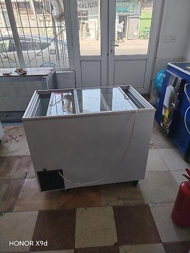 Soyuducu avadanlığı: Sürüşən şüşə qapaqlı vitrin tipli dondurucu. Ağ rəngli korpusa — 2