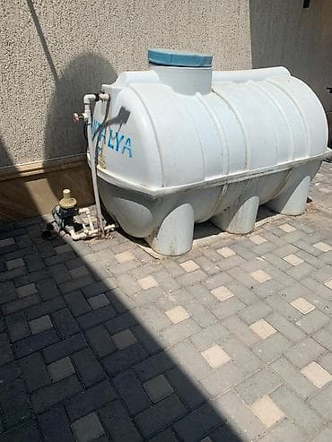 . Su çəni 1.5 tonn - 180manata. İki il istifadə olunub və yer alti su