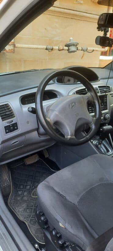 tək oturacaqlar: Hyundai Matrix: 1.6 l | 2008 il Universal — 6