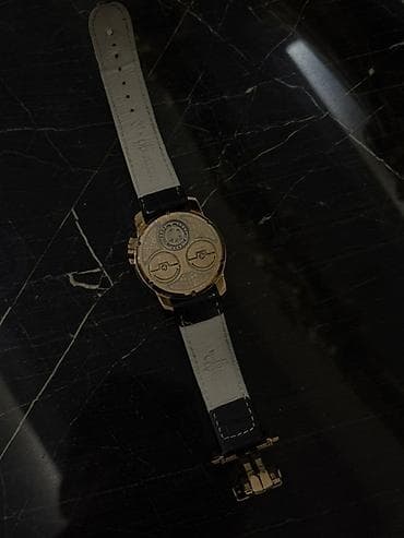 antikvar qol saat: Dəyirmi formalı korpusu, qızılı çəhrayı rəngli detalları və qara dəri — 2