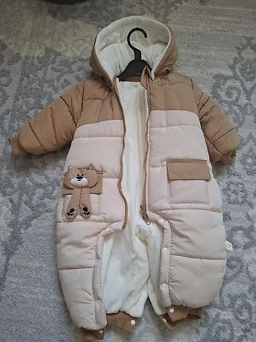 Uşaq üçün qışlıq kombinezon. Alinib istifade olunmayib. men qiz hem
