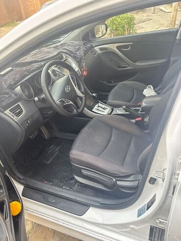 aston martin vanquish 5.9 at: Hyundai Elantra: 1.8 l | 2011 il Sedan — 9