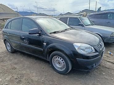 yan guzguler: Kia Rio: 1.4 l | 2006 il Hetçbek — 8