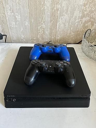 Sony PlayStation 4 Slim oyun konsolu Paketə daxildir: - PS4 Slim