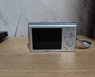 sony cyber shot: Sony rəqəmsal fotoaparat (kompakt) - Gümüşü korpus, bilək qayışı ilə — 1