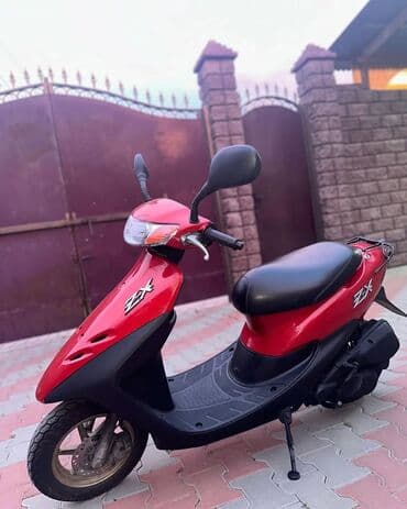 w202 dönmə işığı: Qırmızı rəngdə ZX skuter Məlumat: - Kompakt və yüngül kuzov, şəhər — 2