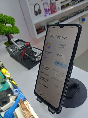 tikanlı tel: Poco C40, 64 GB, rəng - Qara, Barmaq izi — 3