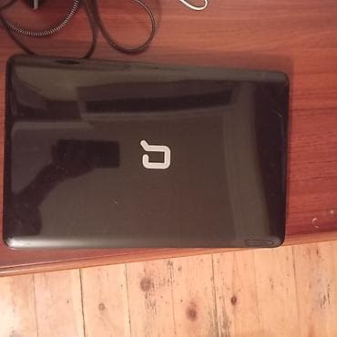 hp g6: HP Compaq noutbuk - Model: Compaq (üst qapaqda Compaq loqosu, daxildə — 1