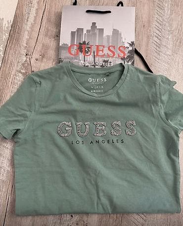 Etiketi yoxdu paketi var 150 azn alinib GUESS Los Angeles qadın