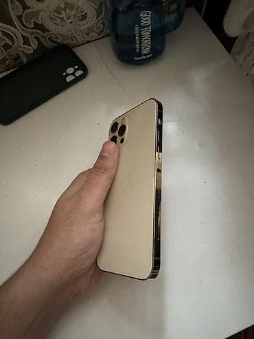 iphone 12 dubay: IPhone 12 Pro, 128 GB, Qızılı, Simsiz şarj, Face ID — 5