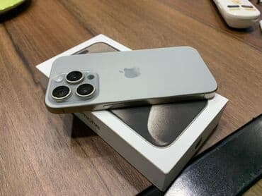 52 telefon: IPhone 15 Pro Max, 256 GB, Space Gray, Face ID — 1