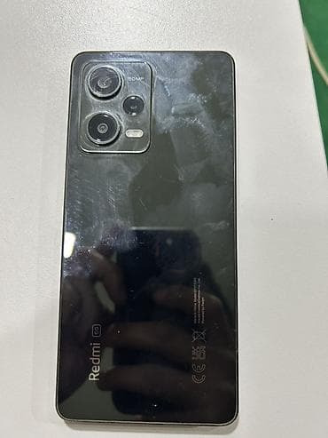 telafonlar: Xiaomi Redmi 5G smartfon - Arxa tərəfdə “Redmi 5G” loqosu və 50 MP — 4