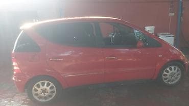 kompressor teh: Mercedes-Benz A160, qırmızı həcmli şəhər hetçbeki. Xüsusiyyətlər: - — 3