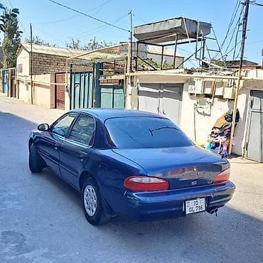 sud ceni: Kia Clarus: 2 l | 1997 il Sedan — 7