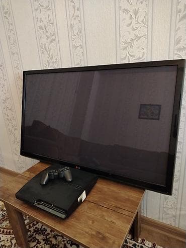 купить playstation 1: Sony PlayStation 3 (PS3) Slim + DualShock 3 gamepad + LG televizor — 3