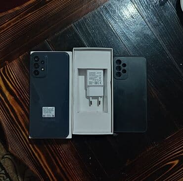 samsunk a32: Samsung Galaxy A23, 128 GB, rəng - Qara, Barmaq izi — 2