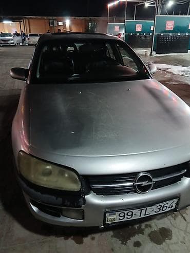qazel radiator: Opel Omega: 2 l | 1996 il 300000 km Sedan — 2