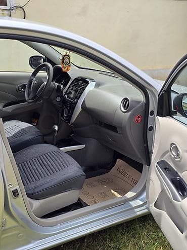 pilus 30 kuza: Nissan Sunny: 1.5 l | 2014 il Sedan — 5