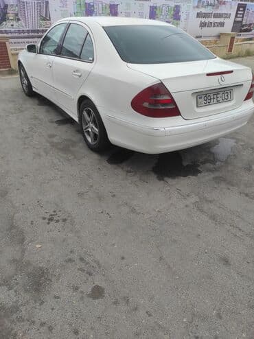 niva aksesuarlari satisi: Mercedes-Benz E 240: 2.6 l | 2003 il Sedan — 4