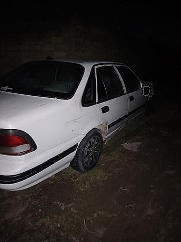 r13 disklər: Daewoo Nexia, ağ rəng, sedan gövdə. Xüsusiyyətlər: maşın sokulur — 1
