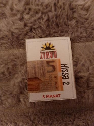 5: Zirvə Hissə 2 kitabı. Üz qabığında “5 manat” qeyd olunub. Nəşr ağ — 1
