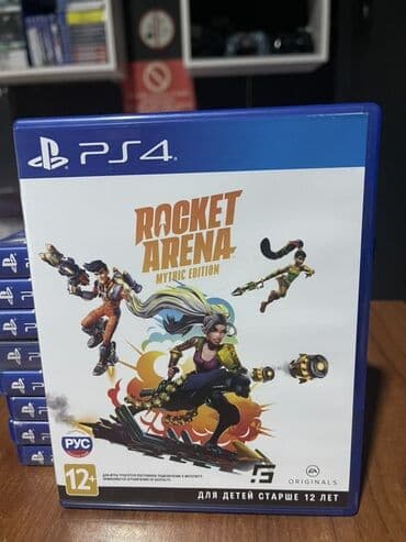 Oyun diskləri və kartricləri: PS4 üçün Rocket Arena: Mythic Edition oyunu. Bu, PlayStation 4