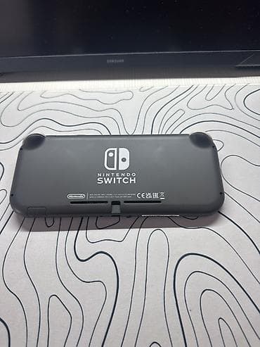 nini: Satılır: Nintendo Switch Lite (İdeal vəziyyətdə) Nintendo Switch Lite — 4