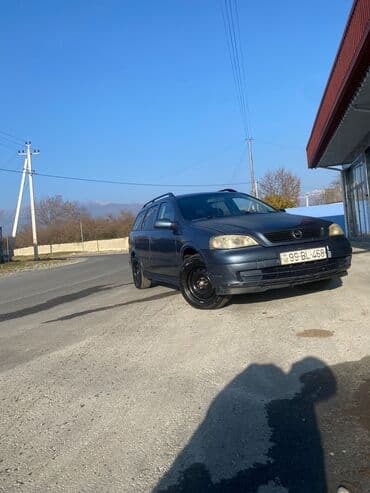 oka satılır: Model: Opel Astra Caravan (universal kuzov) Rəng: tünd boz Yanacaq — 14