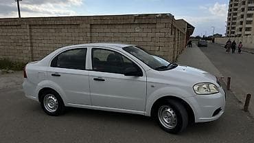 kia cerato 2008: Chevrolet Aveo: 1.4 l | 2011 il 215489 km Sedan — 6