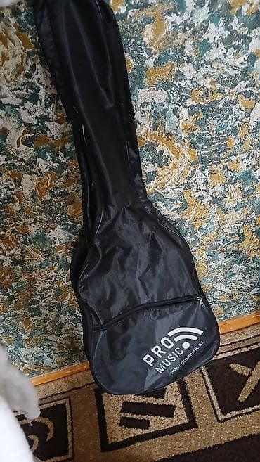 gitara capo: Toledo gitara, çanta, 4 mediator. SATILIR. İki yüz əlli manata — 4