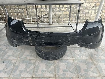 passat b5 ehtiyat hisseleri: Məhsul: Arxa bamper - Növ: Orijinal plastik arxa bamper - Rəng: Qara — 9