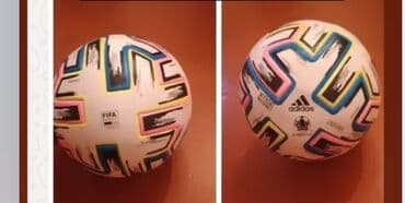 Adidas FIFA futbol topu, ağ rəngdə, müxtəlif rəngli həndəsi naxışlarla