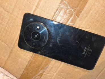 Mini: Redmi smartfon (arxa panel foto). Xüsusiyyətlər: - Dairəvi modulda — 1