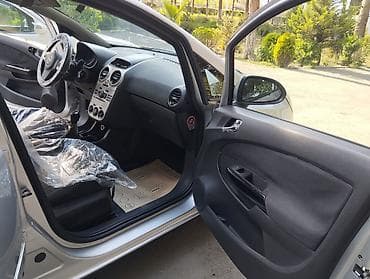 kuba portero 8000: Opel Corsa D, 5 qapılı hetçbek, gümüşü rəng. Texniki xüsusiyyətlər: - — 5