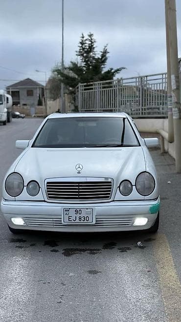 rcd pərdə: Mercedes-Benz E-Class (W210), ağ rəngli sedan 98 madelin yan — 1