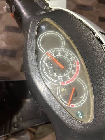 elektrik müherrik: Skuter XROAD – ağ rəngdə şəhər içi hərəkət üçün praktik və qənaətcil — 6