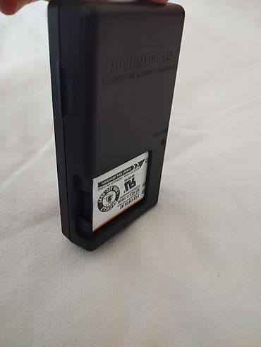 asus tuf gaming: Fujifilm BC-45A şarj cihazı + NP-45 litium-ion batareya - Model — 1