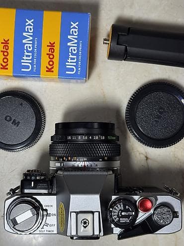 instax mini 12 en ucuz: 1979-cu il Yaponiya istehsalı. Olympus OM 10 35 mm film ilə işləyən — 5