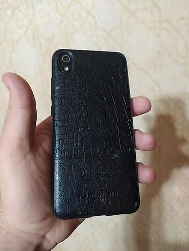 Видеоигры и приставки: Redmi 7A, 32 ГБ, цвет - Голубой, Сенсорный — 7