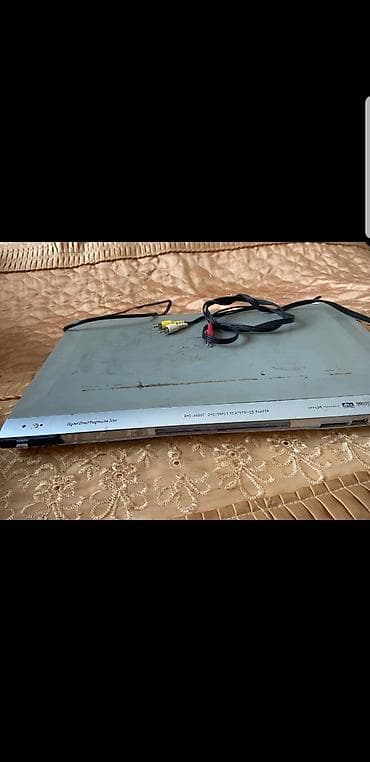 DVD oynadıcı - Model üzərində qeyd: “DVD-6500C” (ön paneldə görünür)