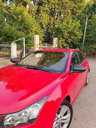 cruze diffuser: Chevrolet Cruze sedan – qırmızı rəng, benzinlə işləyən önötürücülü — 1
