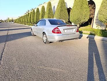 mersedes spoyler: Mercedes-Benz E-Class sedan (W211), gümüşü rəng. Xüsusiyyətlər: - — 6
