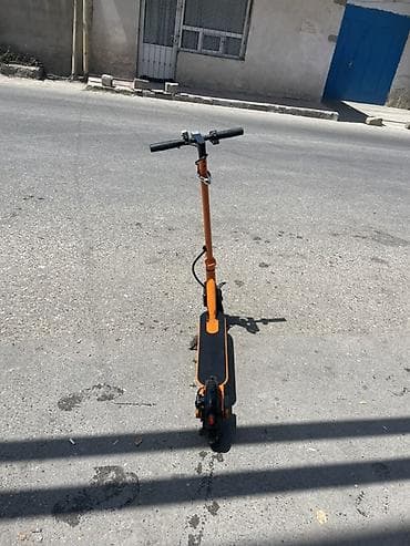 Elektrik skuter – narıncı rəng - Şəhərdaxili gediş-gəliş üçün yığcam