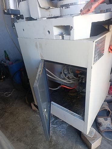 ural ot bicen: Metal profillər və borular üçün sənaye tipli kəsim dəzgahı. Şəkillərdə — 2