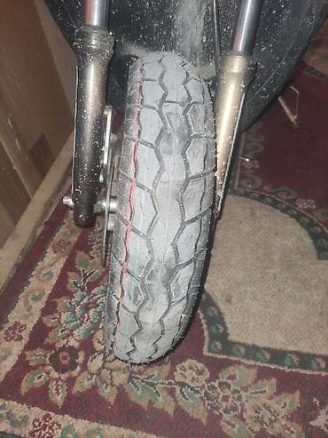 statır: Qara rəngli şəhər skuter/moped bir balaca xerci var 1 gundur surulmur — 9