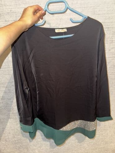 Qadın bluzu - Rəng: əsasən qara, ətək və manjet hissəsində yaşıl