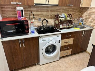 7 ci mikrorayon yeni tikili: Nərimanov rayonu,Nənəmin təndirinin yanında,2 otaqlı,təmirli,əşyalı — 10