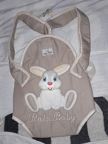 - Uşaq üçün önlük/daşıyıcı “Rain Baby”: Yumşaq, yastıqlanmış bej